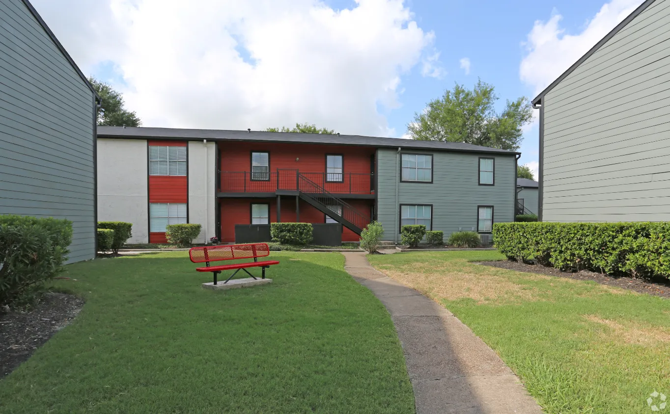 exterior courtyard with red bench