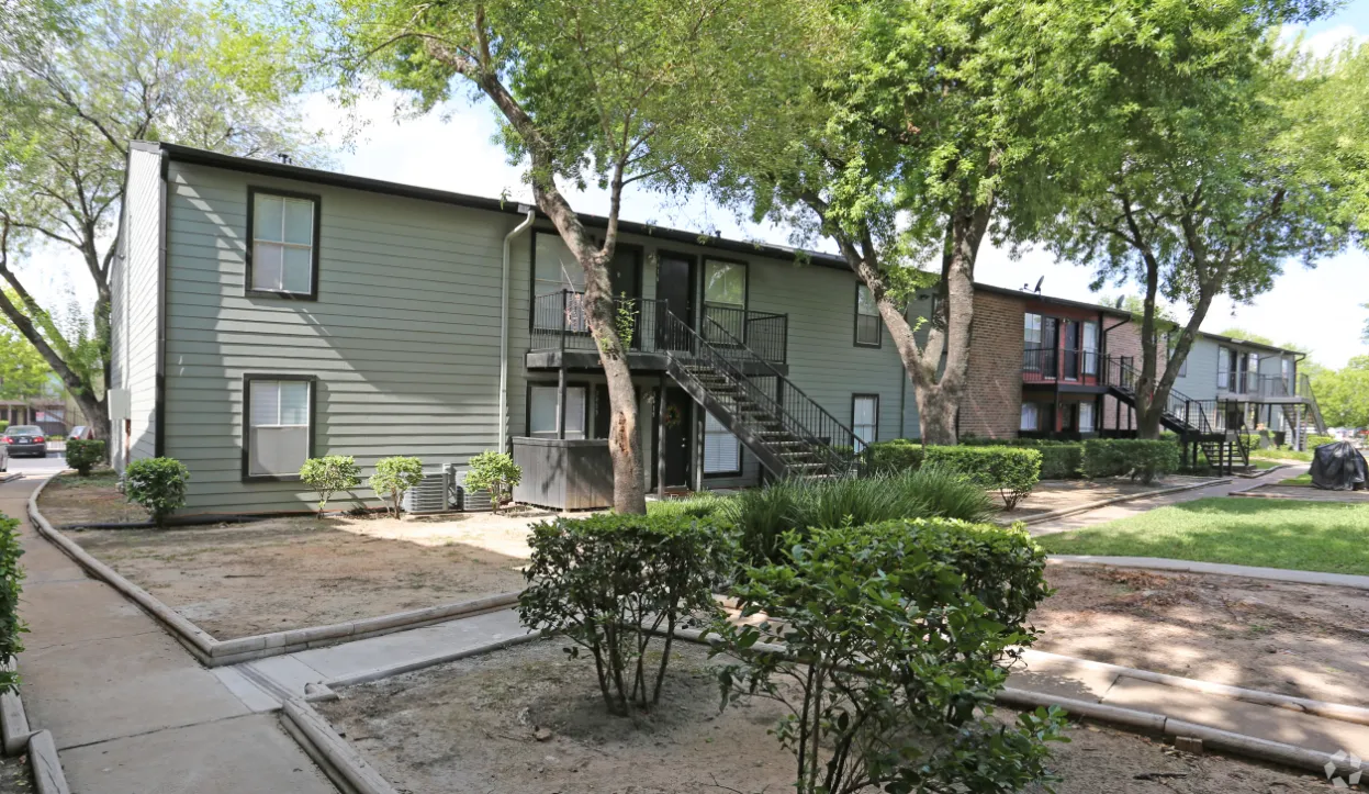 exterior with walking path and trees
