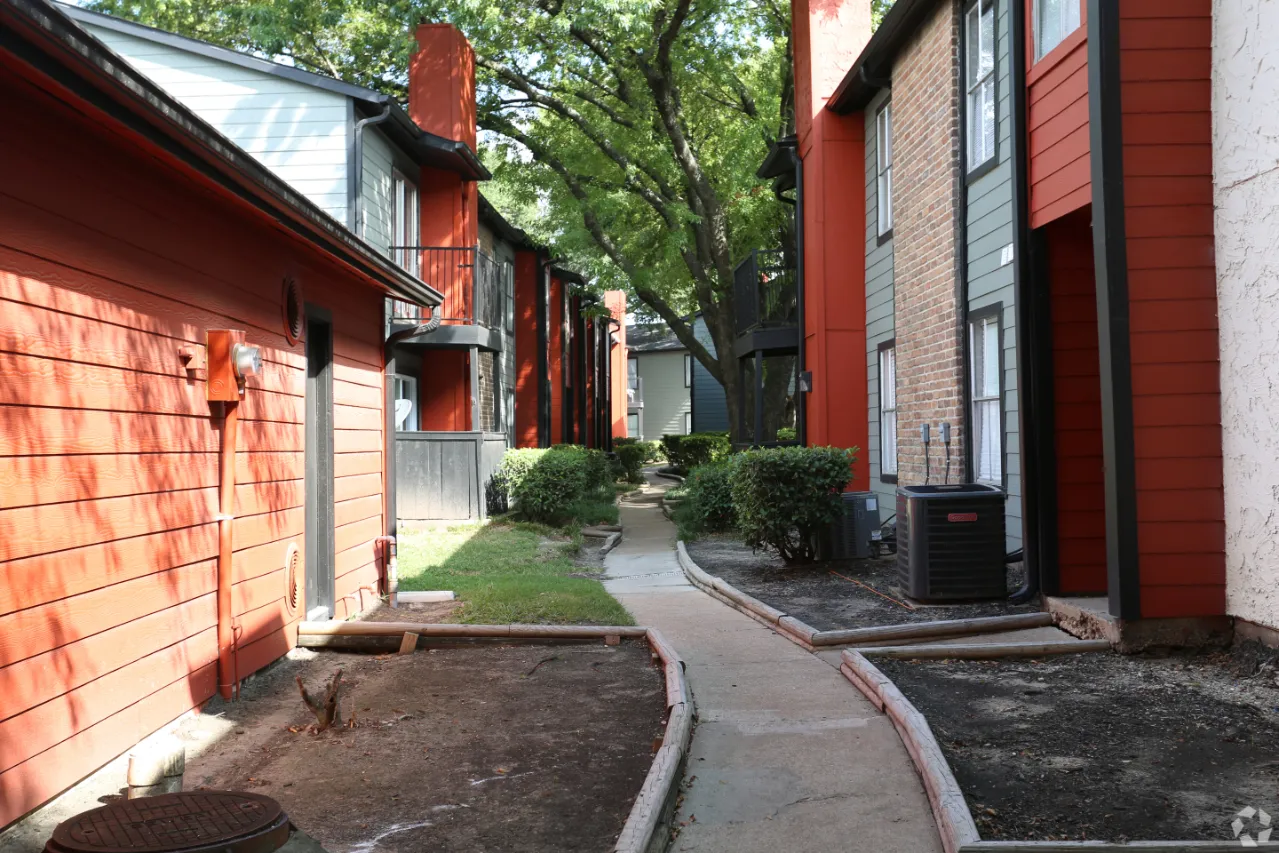 exterior with walking path and trees