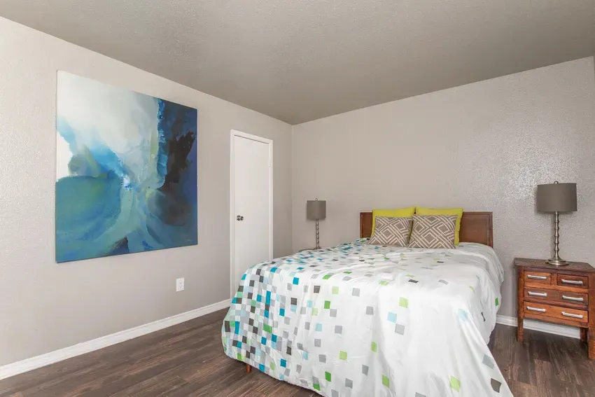 bedroom with bed and wall art