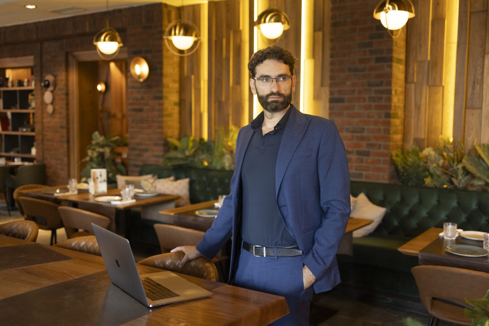 Miroslav Ćurčić standing in a restaurant
