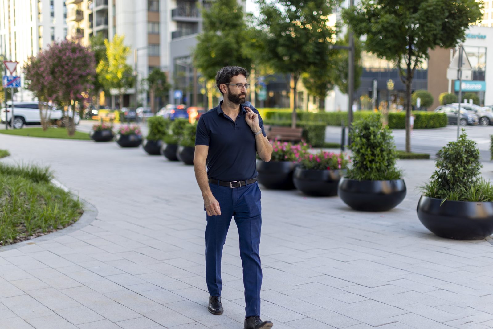 Miroslav Ćurčić walking outdoors in the city