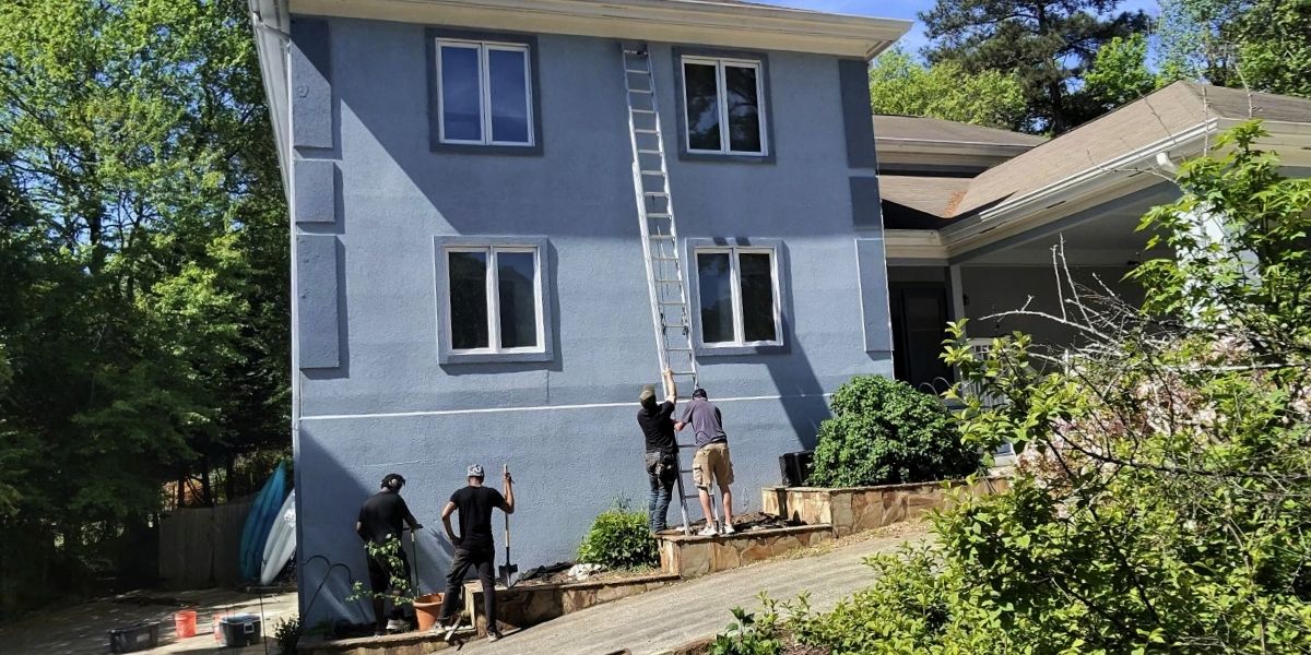user-inserted Professional team installing and maintaining permanent trim lighting on a two-story residential home, ensuring precise placement and long-lasting outdoor illumination