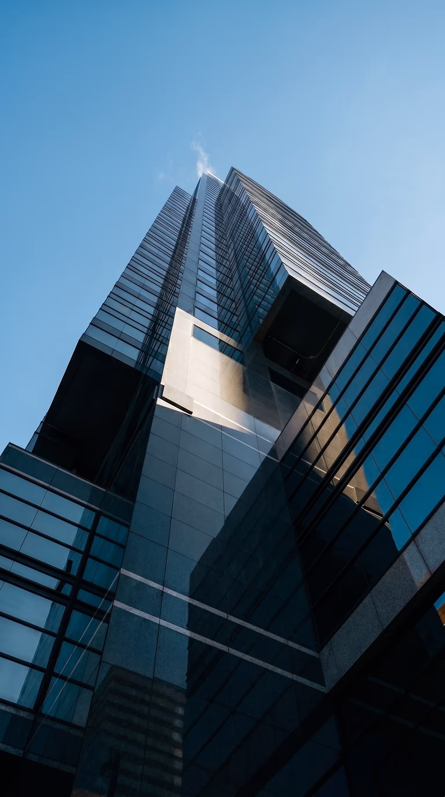 Modern glass office tower representing Surge Energy, a Calgary-based oil-focused exploration and production company listed on the TSX