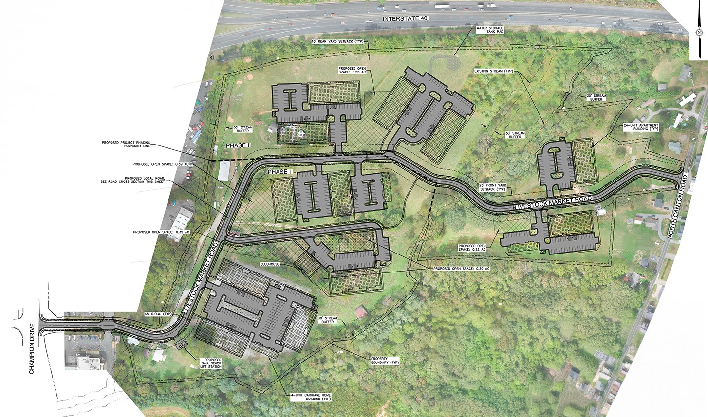 Aerial site plan map showing proposed phases and layout for a residential development near Interstate 40, including buildings, parking lots, roads, stream buffers, and open spaces.