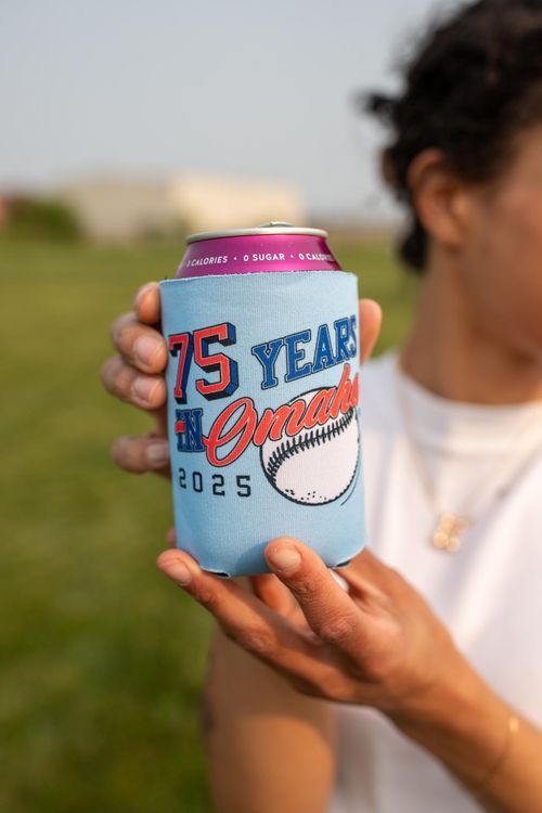 A person holding a custom designed koozie in Omaha, NE for the CWS