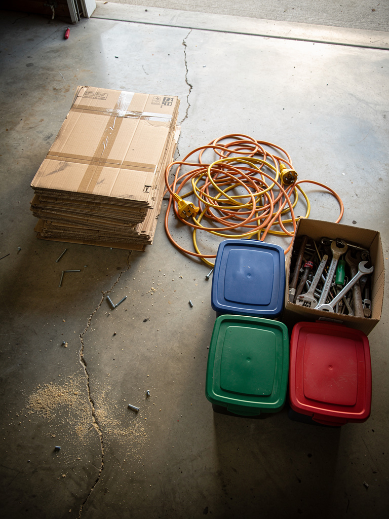 Garage items being sorted for cleanout