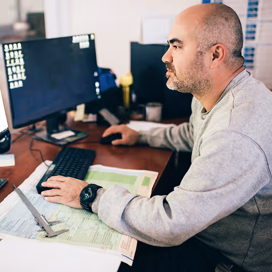 A council asset manager at his desk