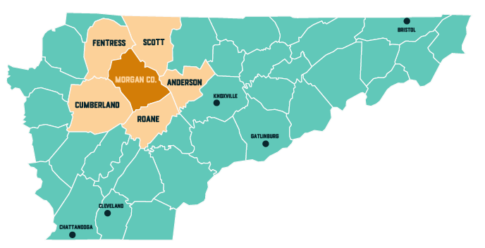 Map of Tennessee highlighting Morgan County and its neighboring counties: Fentress, Scott, Anderson, Roane, and Cumberland, with major cities Knoxville, Gatlinburg, Chattanooga, Cleveland, and Bristol marked.