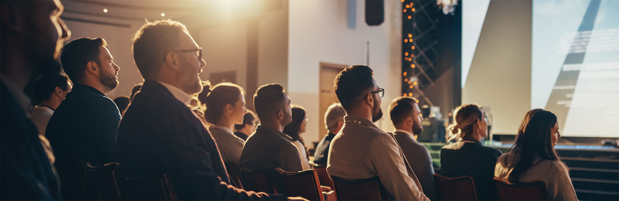 Engaged audience at a speaking event