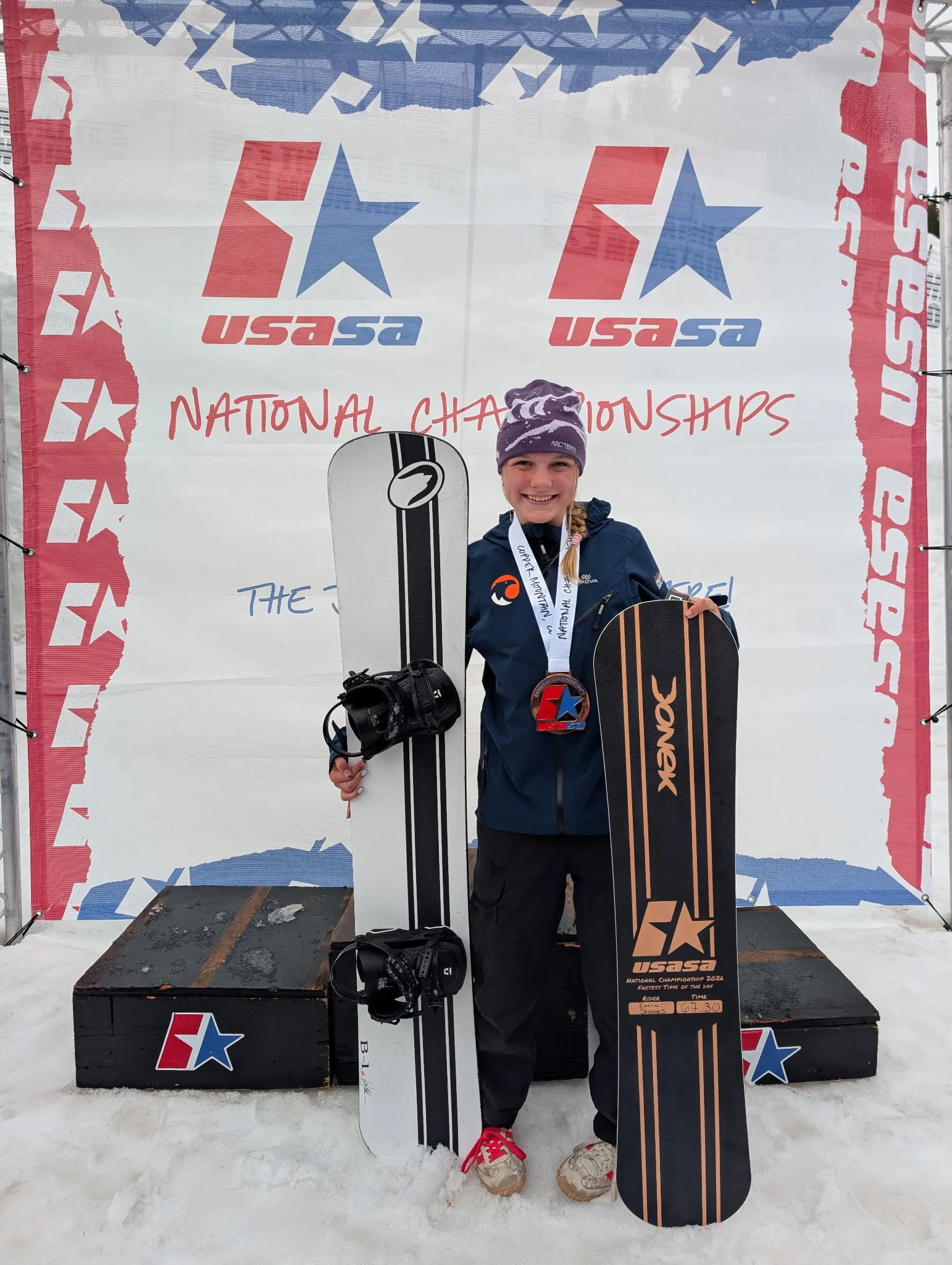 Young athlete competing at a USASA snowboard event