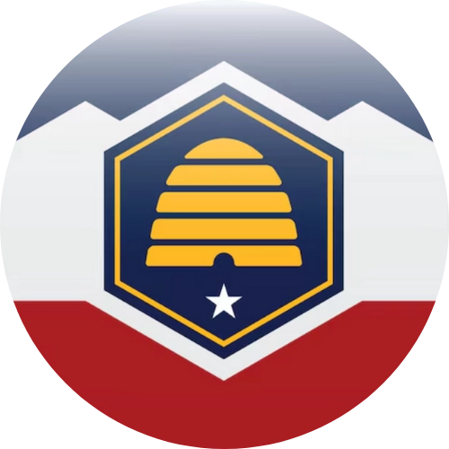 Hexagonal emblem with a yellow beehive and white star on a blue background, set against a stylized mountain and red base.