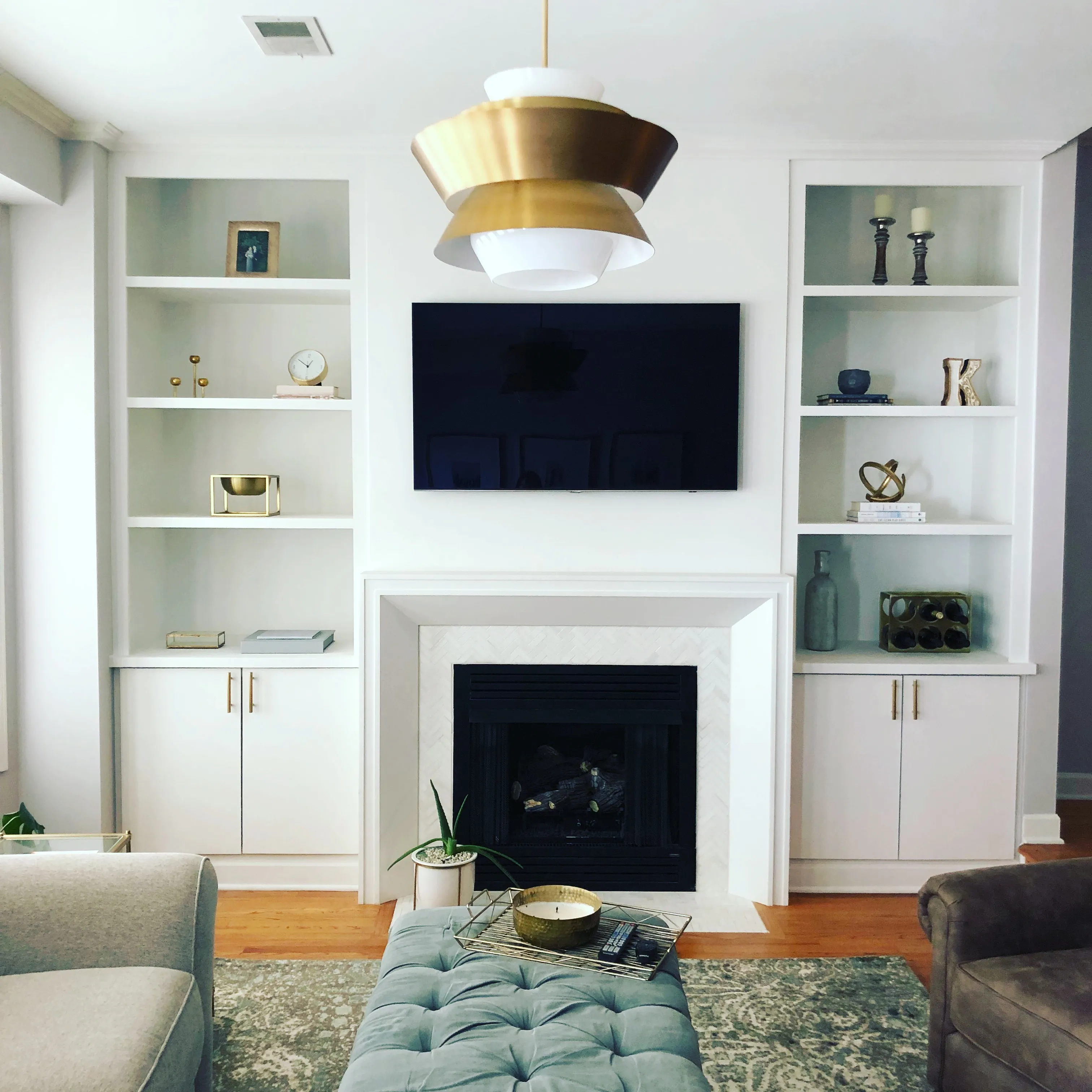 Bucktown custom cabinetry and buillt-ins around fireplace by Wood Contracting
