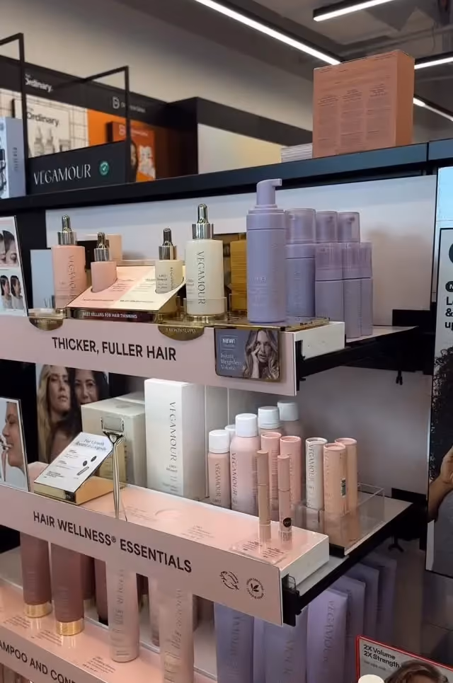 Vegamour hair wellness products displayed on a Sephora store shelf
