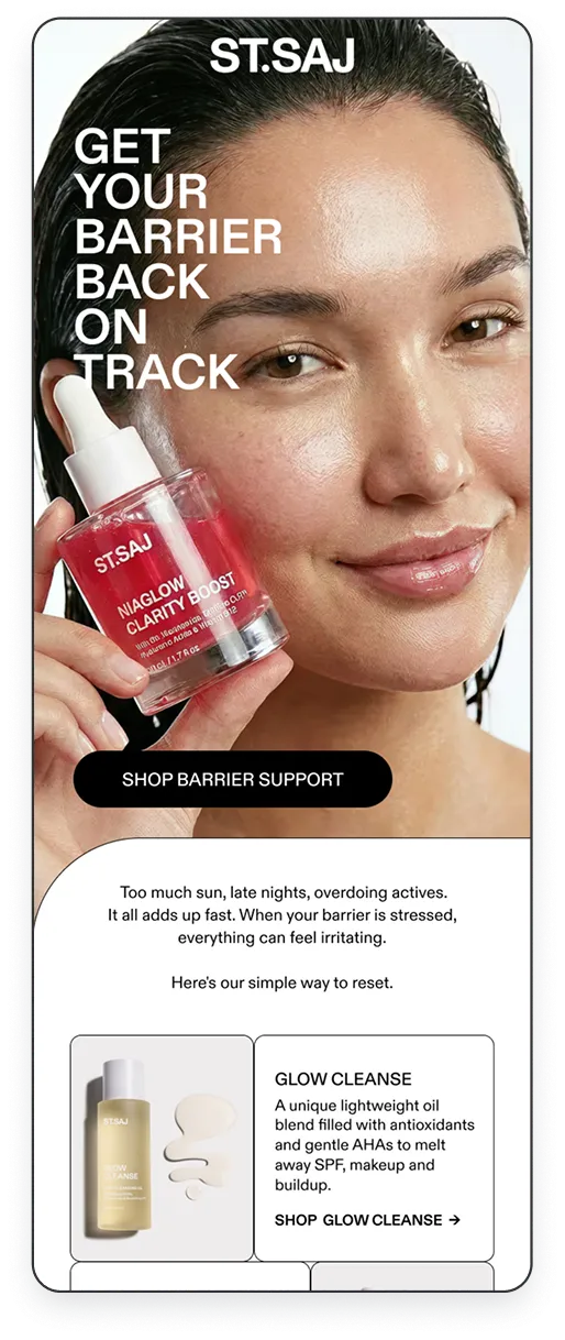 Close-up of a smiling woman with glowing skin holding a bottle of ST.SAJ Niaglow Clarity Boost serum.