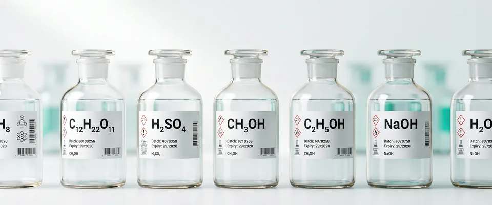 Laboratory chemical bottles in graded glass