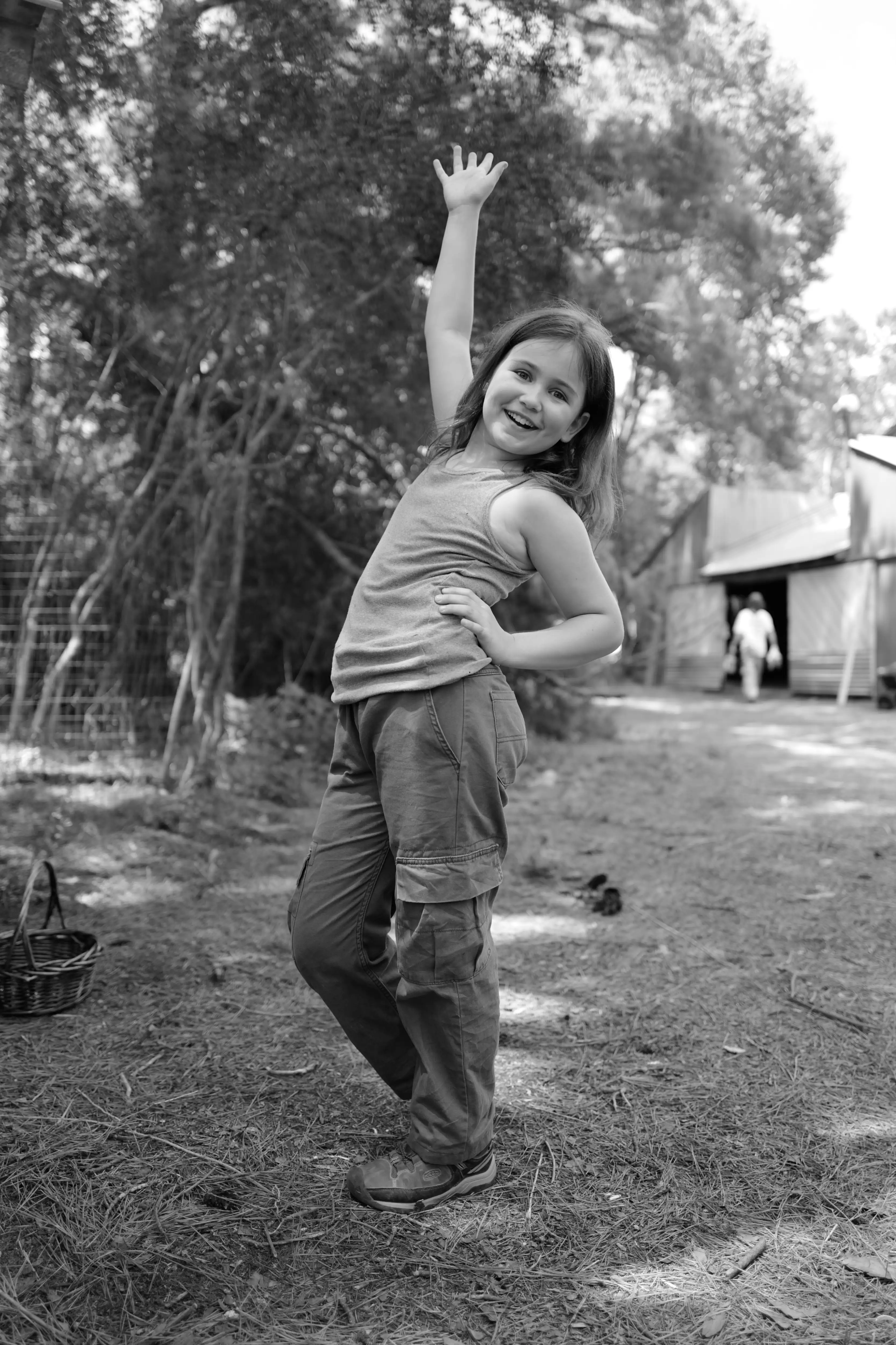 Caroline Brauner as Livvy in a film still from Compound posing confidently outdoors