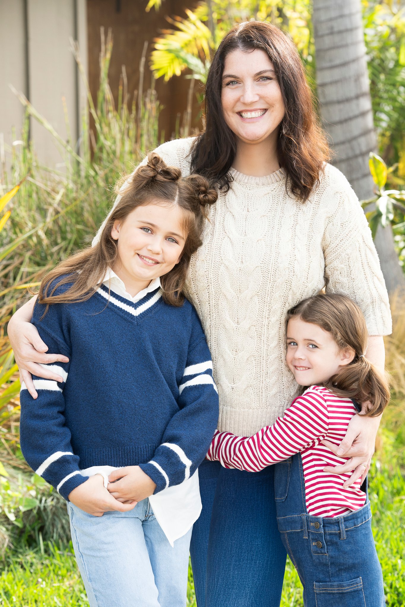 Caroline with her mom and sister