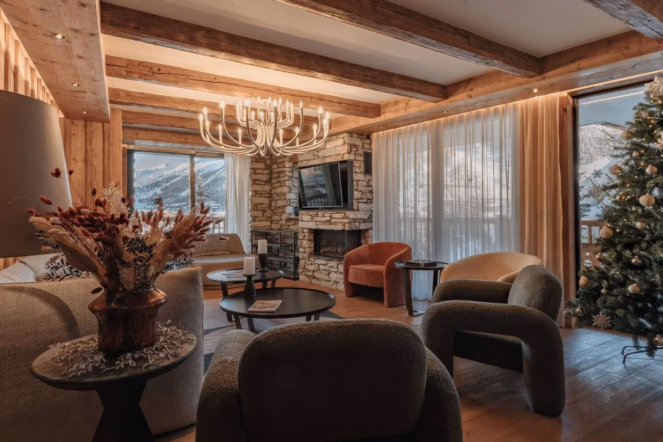 Chalet living room with a stone fireplace