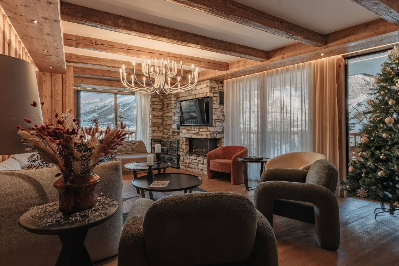 Chalet living room with a stone fireplace