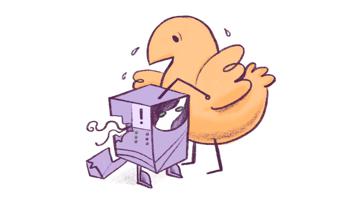 Orange bird comforting a sad gray computer with a cracked screen and broken parts.