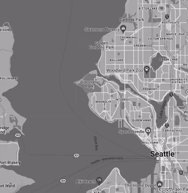Map of Seattle highlighting neighborhoods including Queen Anne, Magnolia, Fremont, and landmarks like Space Needle, Woodland Park Zoo, and Discovery Park.