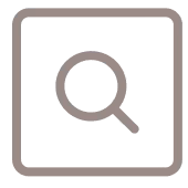Pixelated magnifying glass icon inside a gray square, representing search functionality.