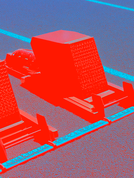 Bloc de départ rouge et bleu illustrant l’usage de l’IA comme point de lancement créatif.