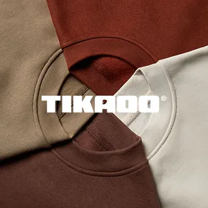 Close-up of four folded crewneck sweatshirts in brown, beige, rust, and cream colors arranged in a circle with the TIKROO logo overlay.