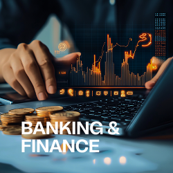 Hand touching laptop keyboard with digital financial charts and stacked coins, labeled Banking & Finance.