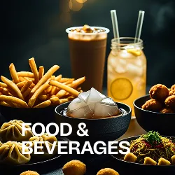 Table with crispy french fries, iced drink, fried balls, and snacks under warm lighting with text Food & Beverages.