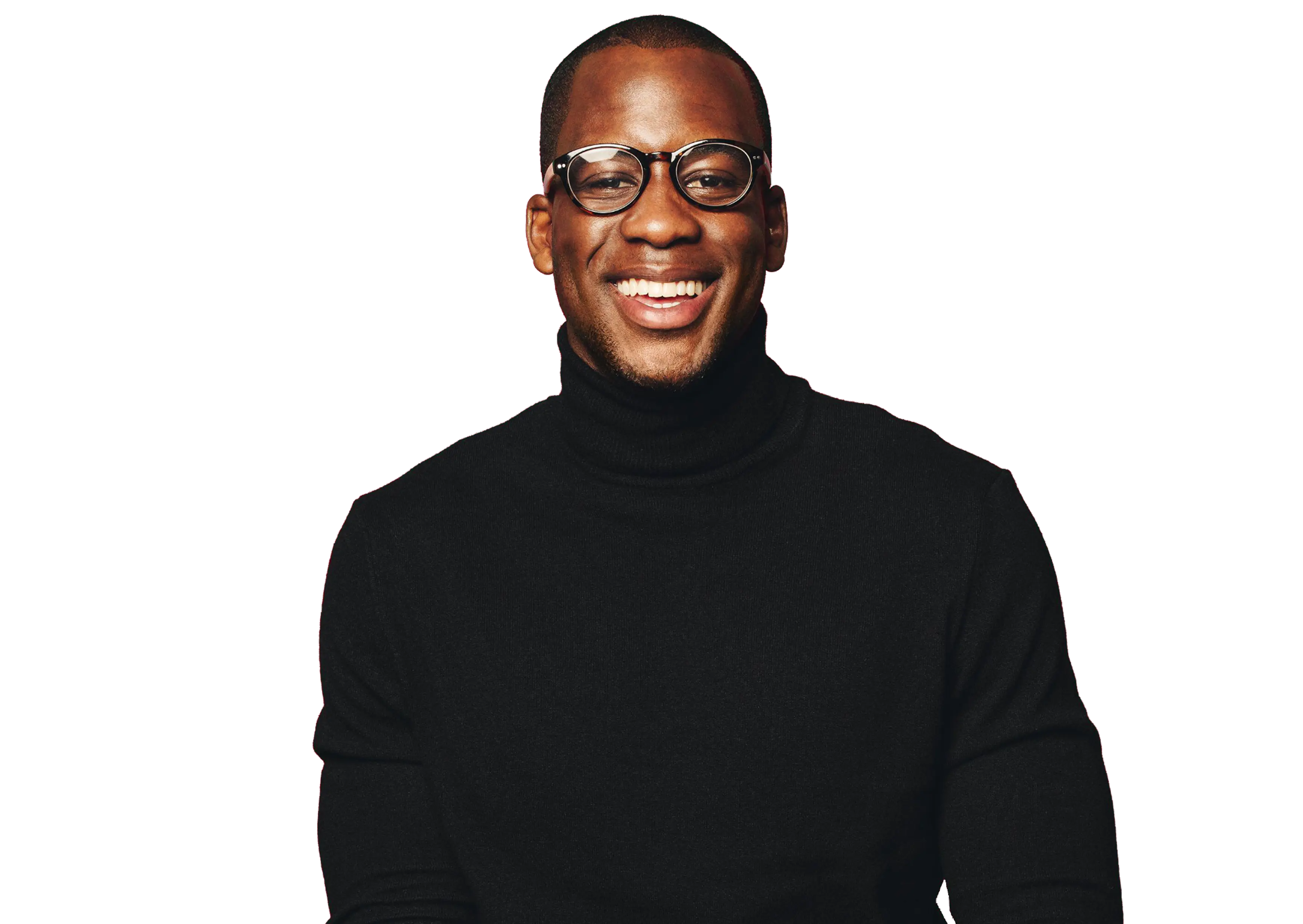 Smiling man wearing round glasses and a black turtleneck sweater.