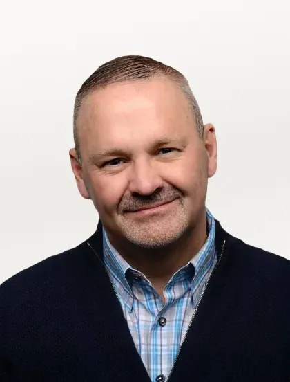 Headshot of Michael Boustridge, CEO of Exadel.