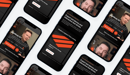 Multiple smartphones displaying tech demo videos and interactive test drive series with user interface.