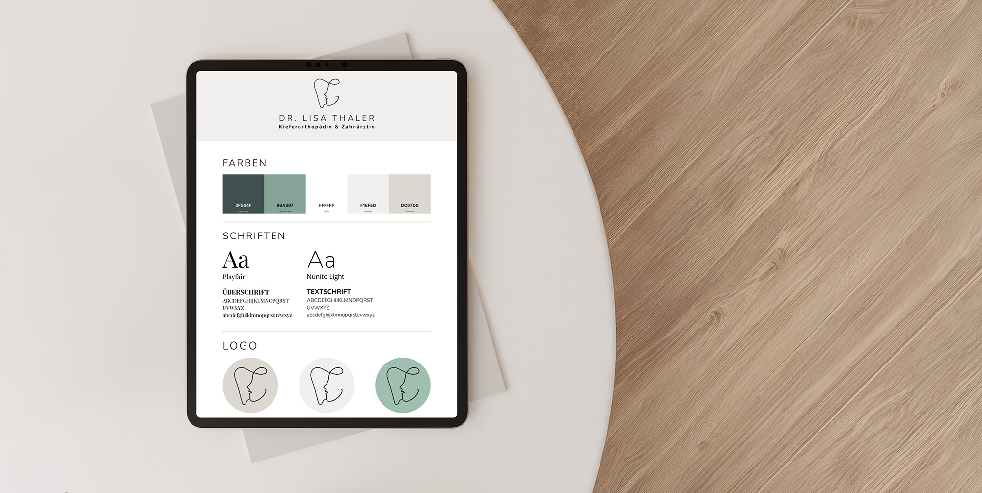 Tablet mit Branding-Richtlinien, Farbmustern, Schriftartbeispielen und Logo-Design für Dr. Lisa Thaler, Kieferorthopädin und Zahnärztin.
