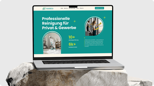Laptop displaying a cleaning service website in German with images of workers cleaning a room and a window.