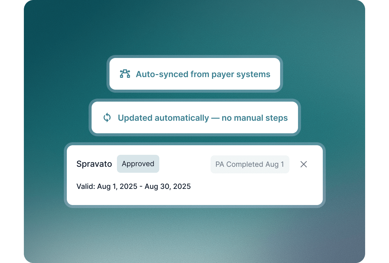 Smiling male doctor in blue scrubs with a stethoscope working on a laptop at a desk.