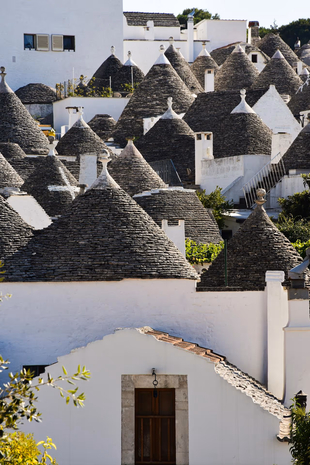 Tradičné kamenné domy Trulli s kužeľovitými strechami v Alberobelle, Taliansko.