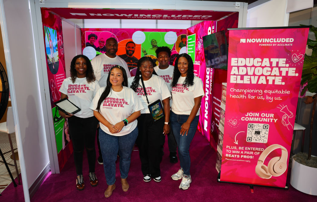 NOWINCLUDED representatives at booth