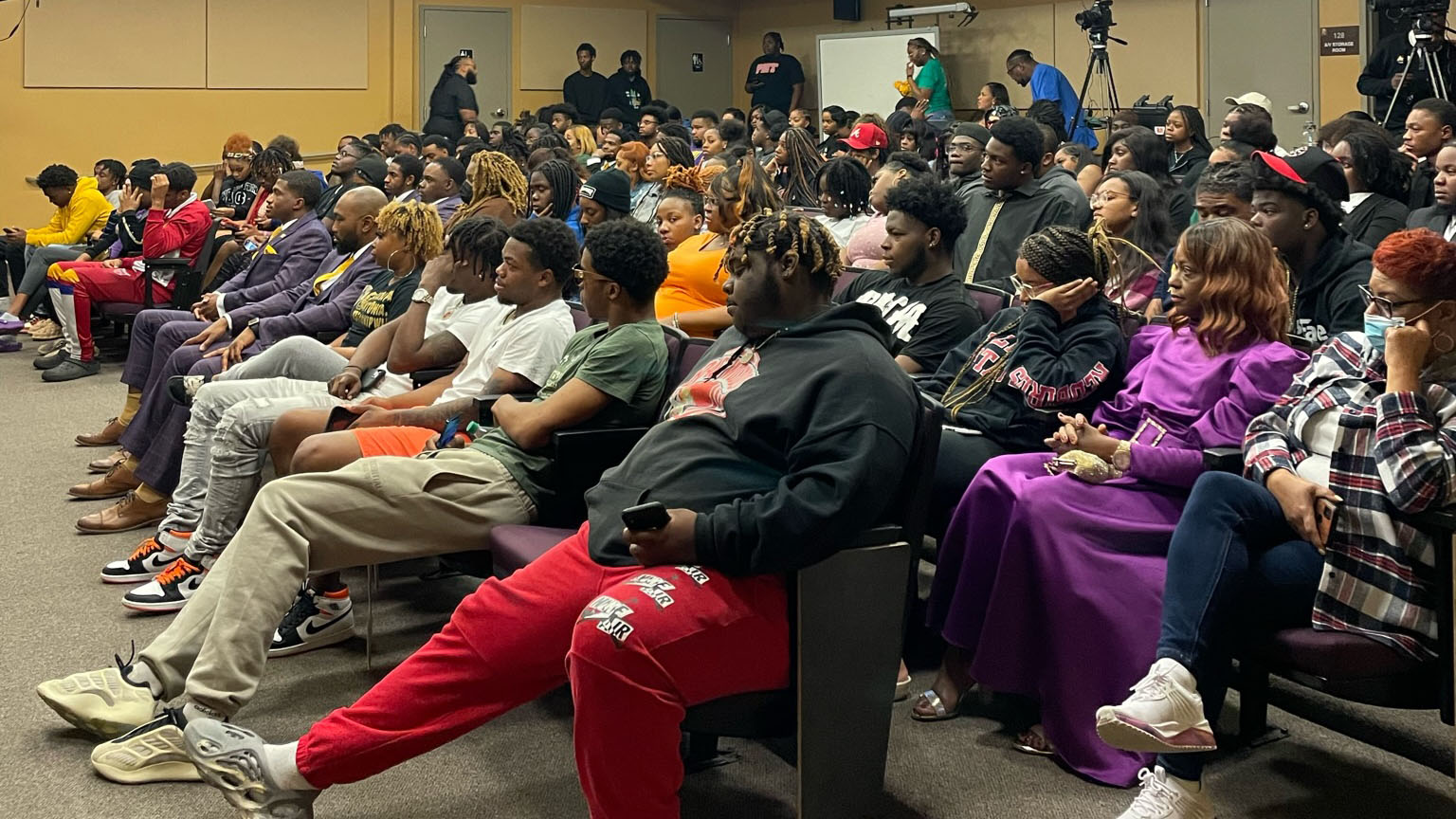 Students listening to Acclinate speakers