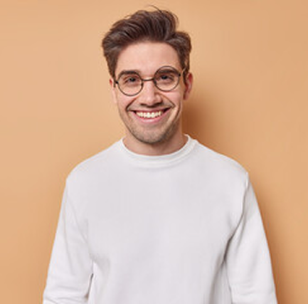 Stock image of a man in a white sweatshirt