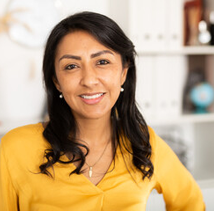 Stock image of a women in a yellow shirt