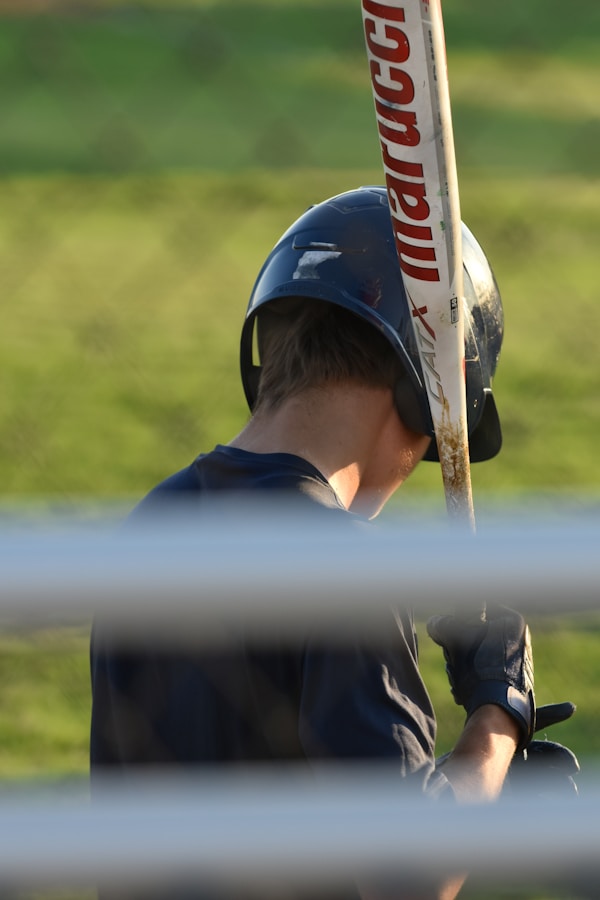Baseball batter close up looking down