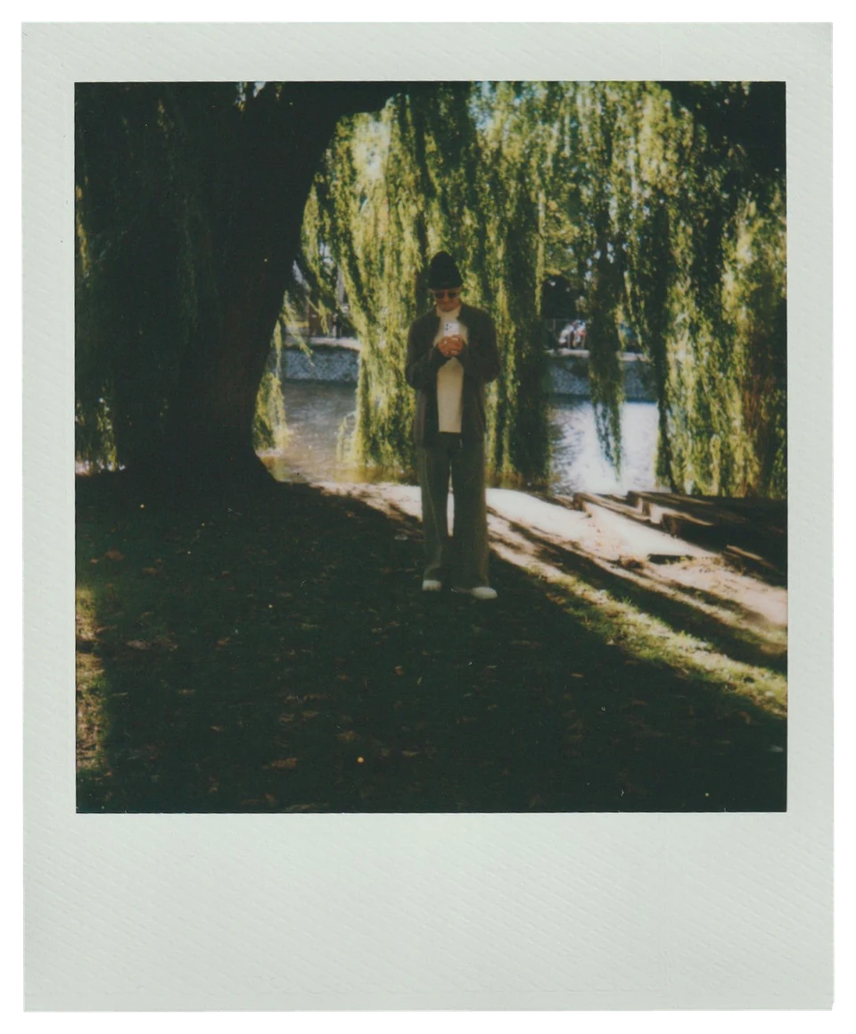Polaroid: Julian Brandt under a weeping willow by the water