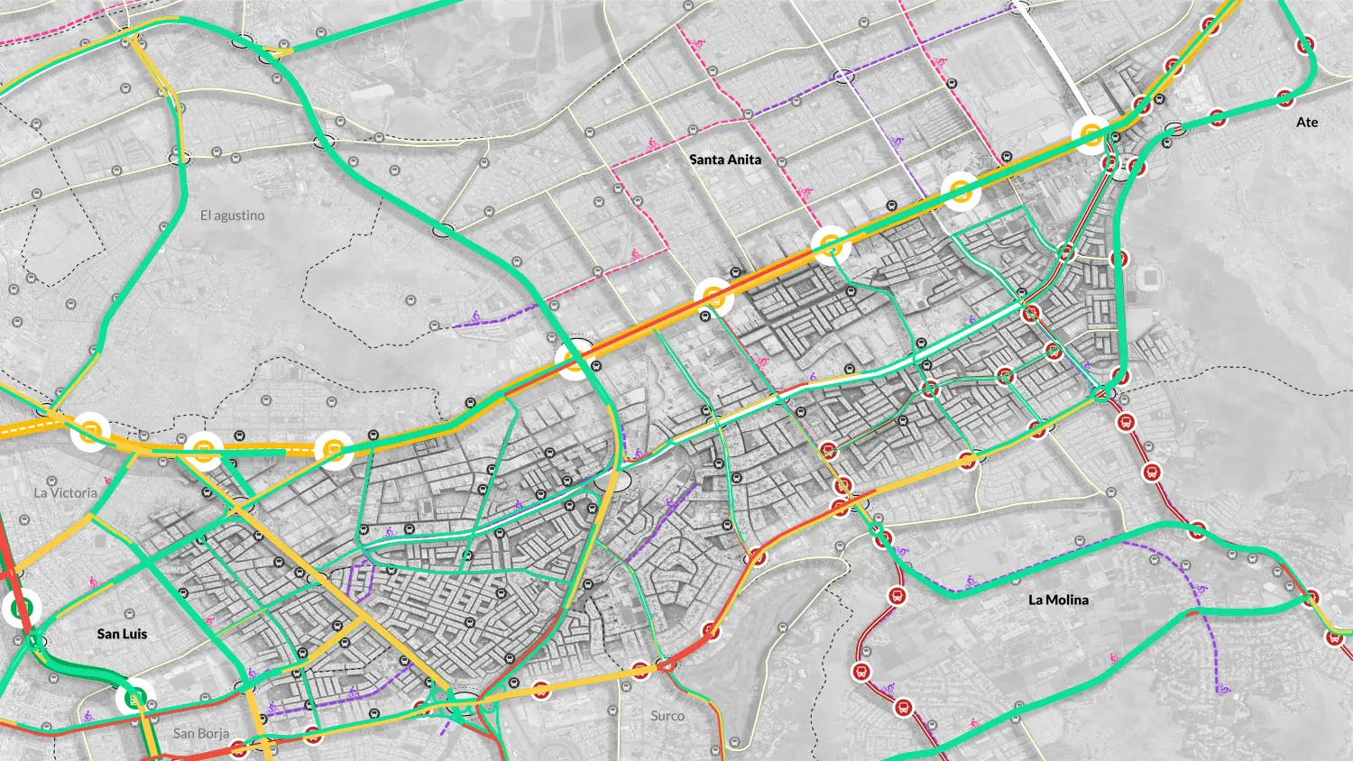 Mapa que muestra rutas de tránsito y carriles para bicicletas en Santa Anita, San Luis, La Molina y distritos cercanos con varias líneas de colores e íconos de tránsito.