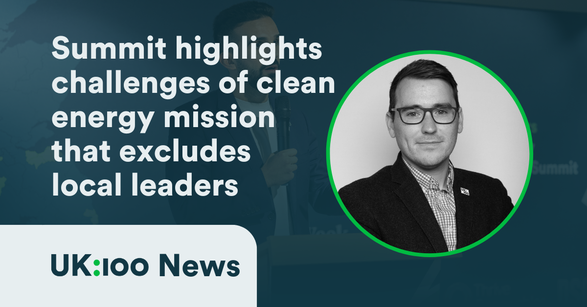Man in glasses discusses clean energy summit challenges for local leaders