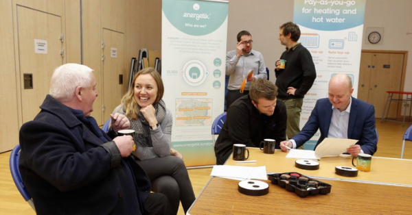 Business meeting with people discussing and working together in a conference room