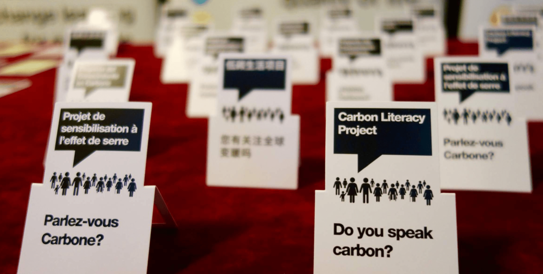 Carbon Literacy Project cards in French and English with human icons