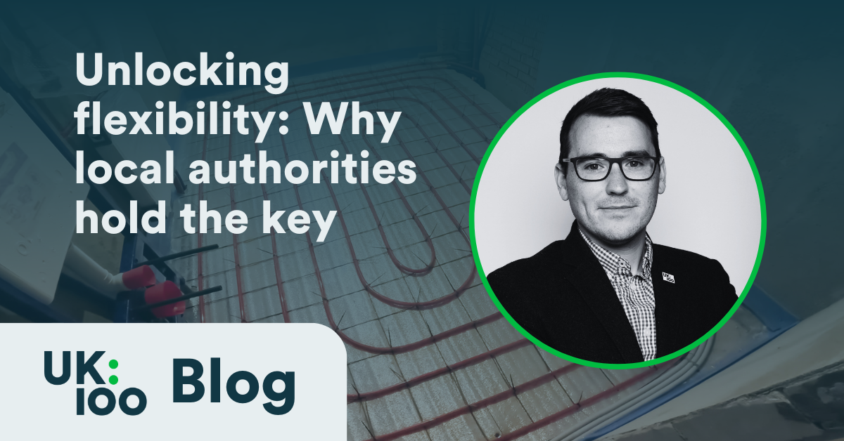 UK100 blog header featuring Christopher Hammond, chief executive, discussing energy flexibility guide for local authorities, with electrical grid infrastructure background