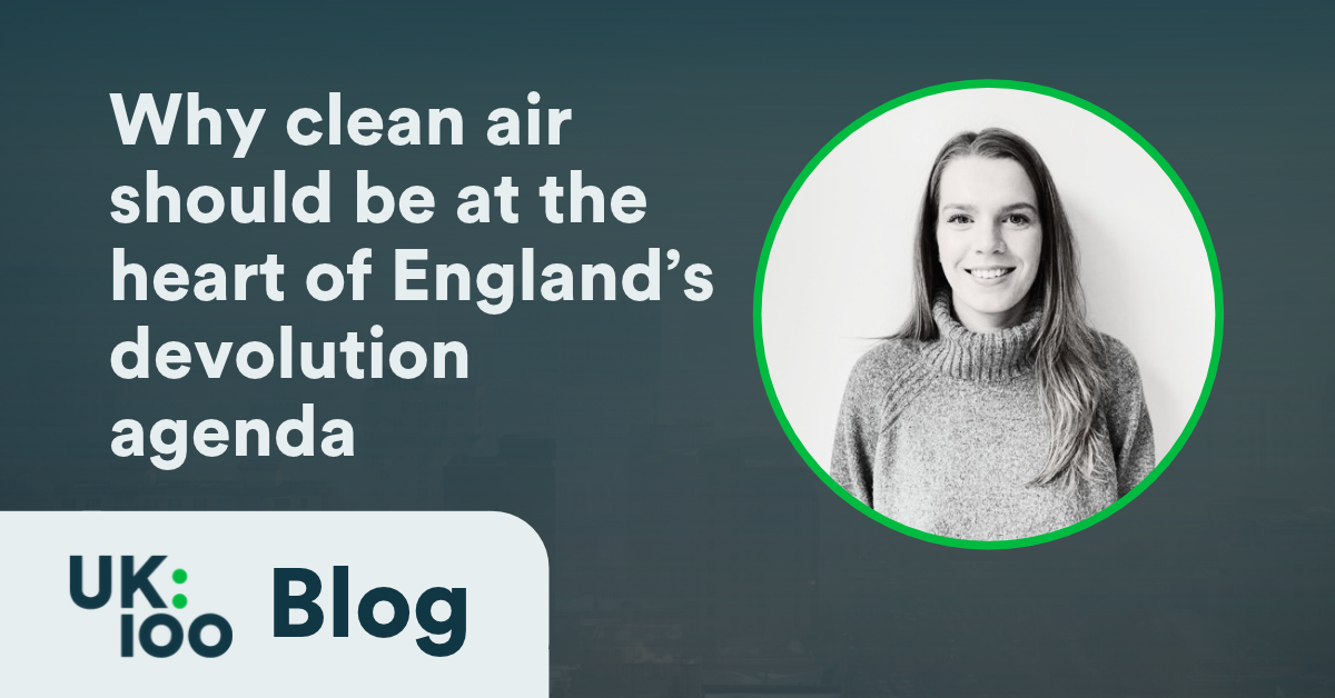 UK100 blog graphic titled "Why clean air should be at the heart of England's devolution agenda". A black-and-white photo of a smiling woman with long hair, wearing a roll-neck jumper, sits in a green-bordered circle on a dark teal background.
